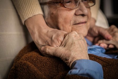 Old senior woman with her granddaughter.